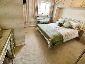 Bedroom One- click for photo gallery